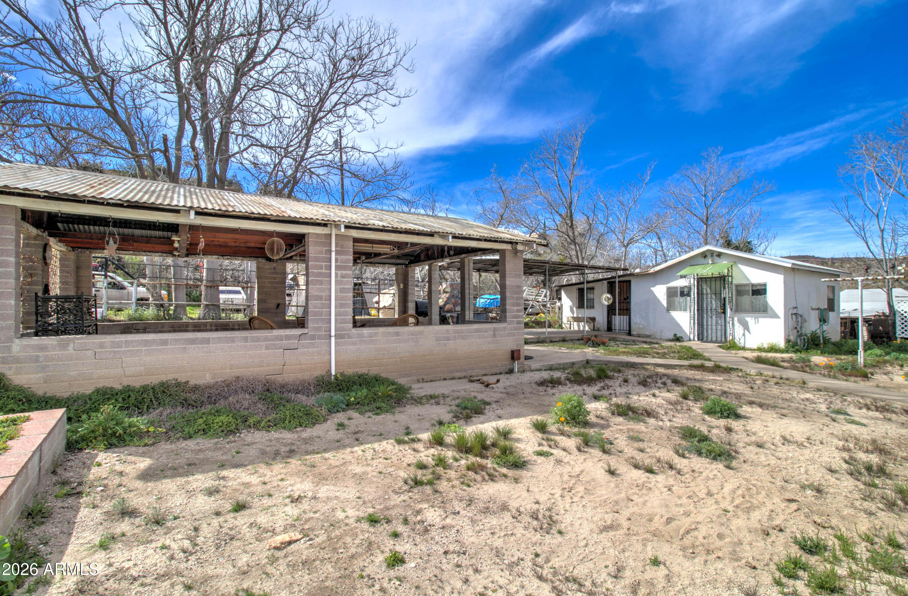 6002 Marion Canyon Street Claypool, AZ 85532 - Photo 10 of 45 a front view of a house with a yard