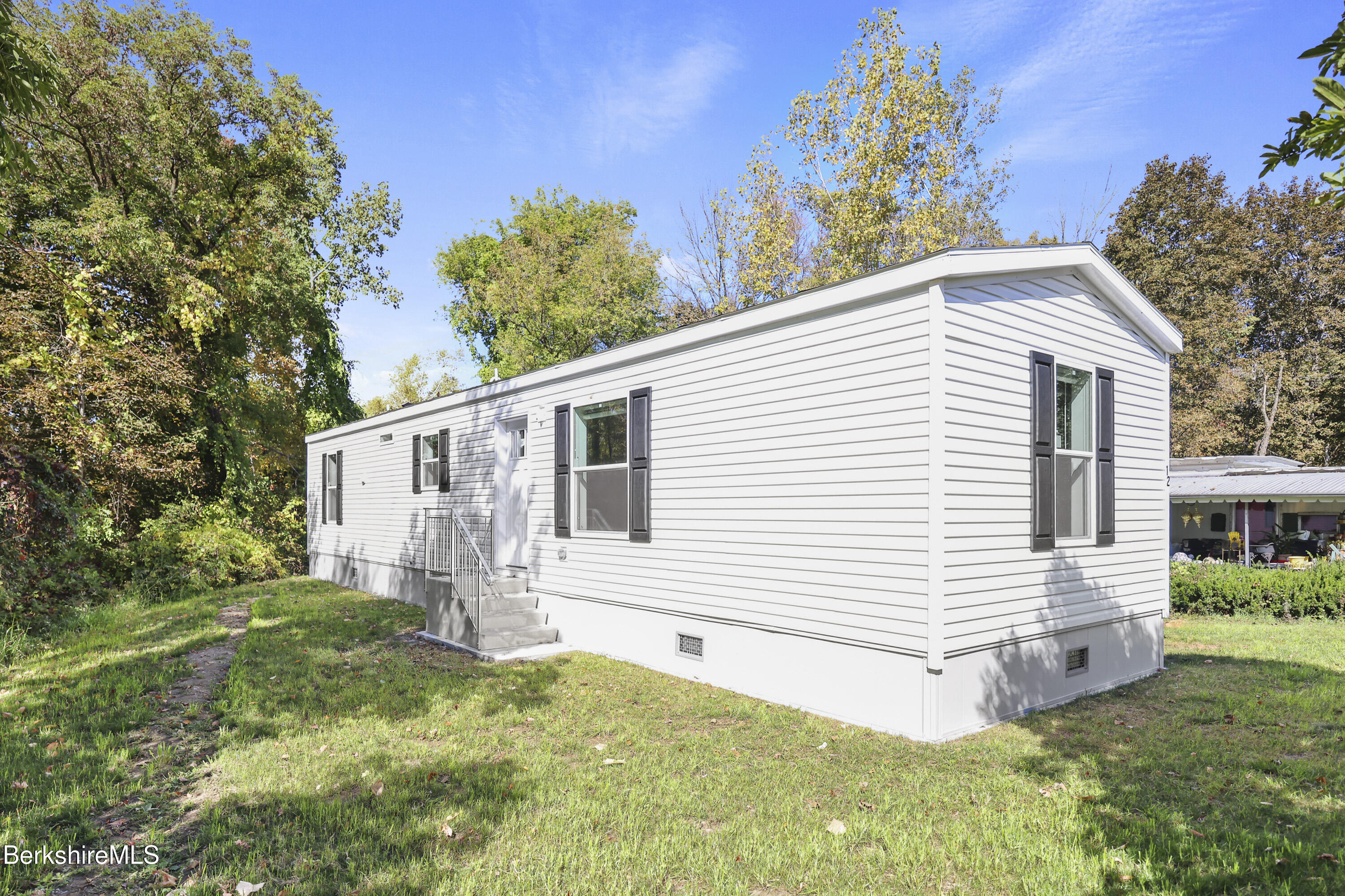 12 Aztec Drive North Adams, MA 01247 - Photo 1 of 14 a view of a house with a yard