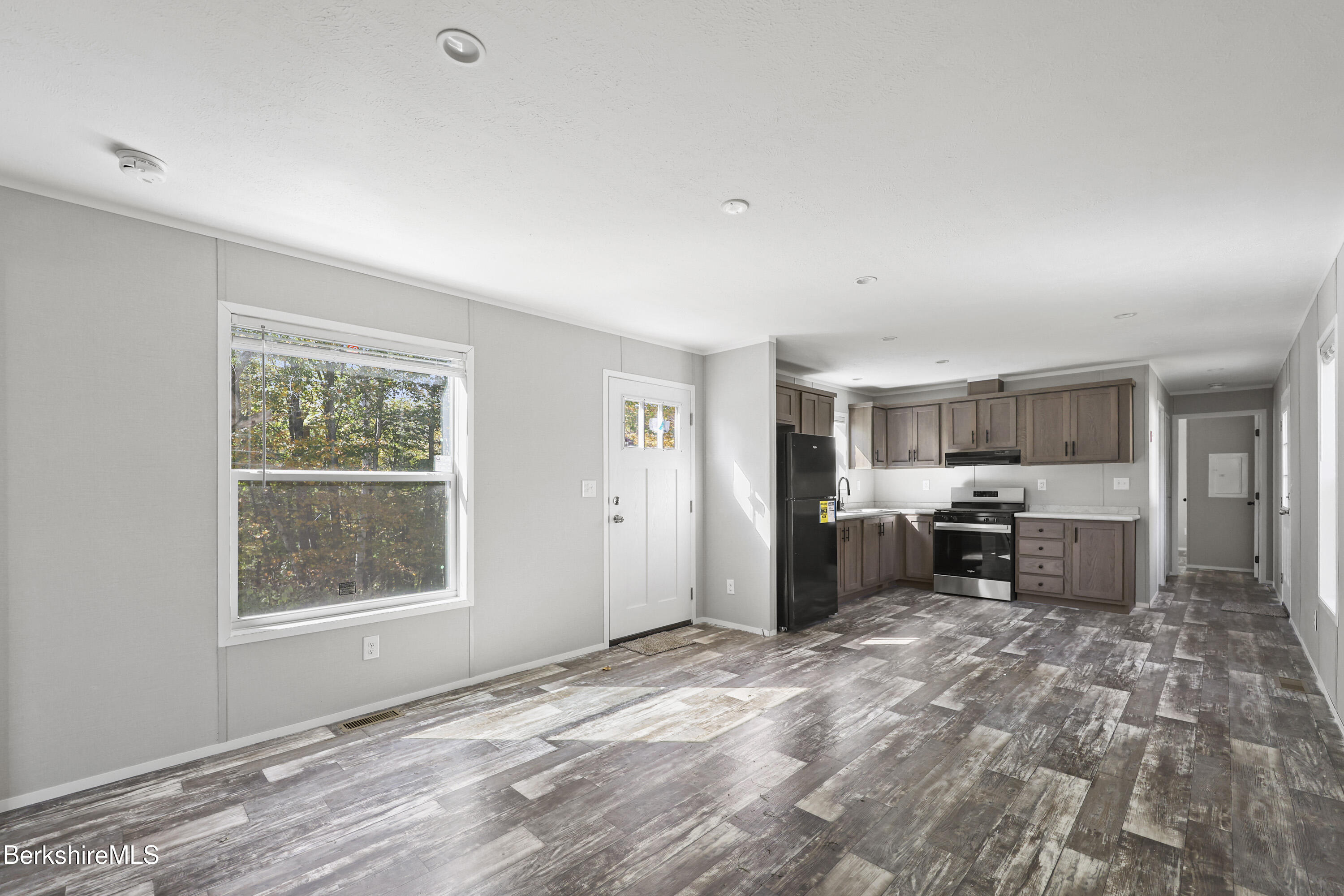 12 Aztec Drive North Adams, MA 01247 - Photo 4 of 14 a view of a livingroom with furniture and windows