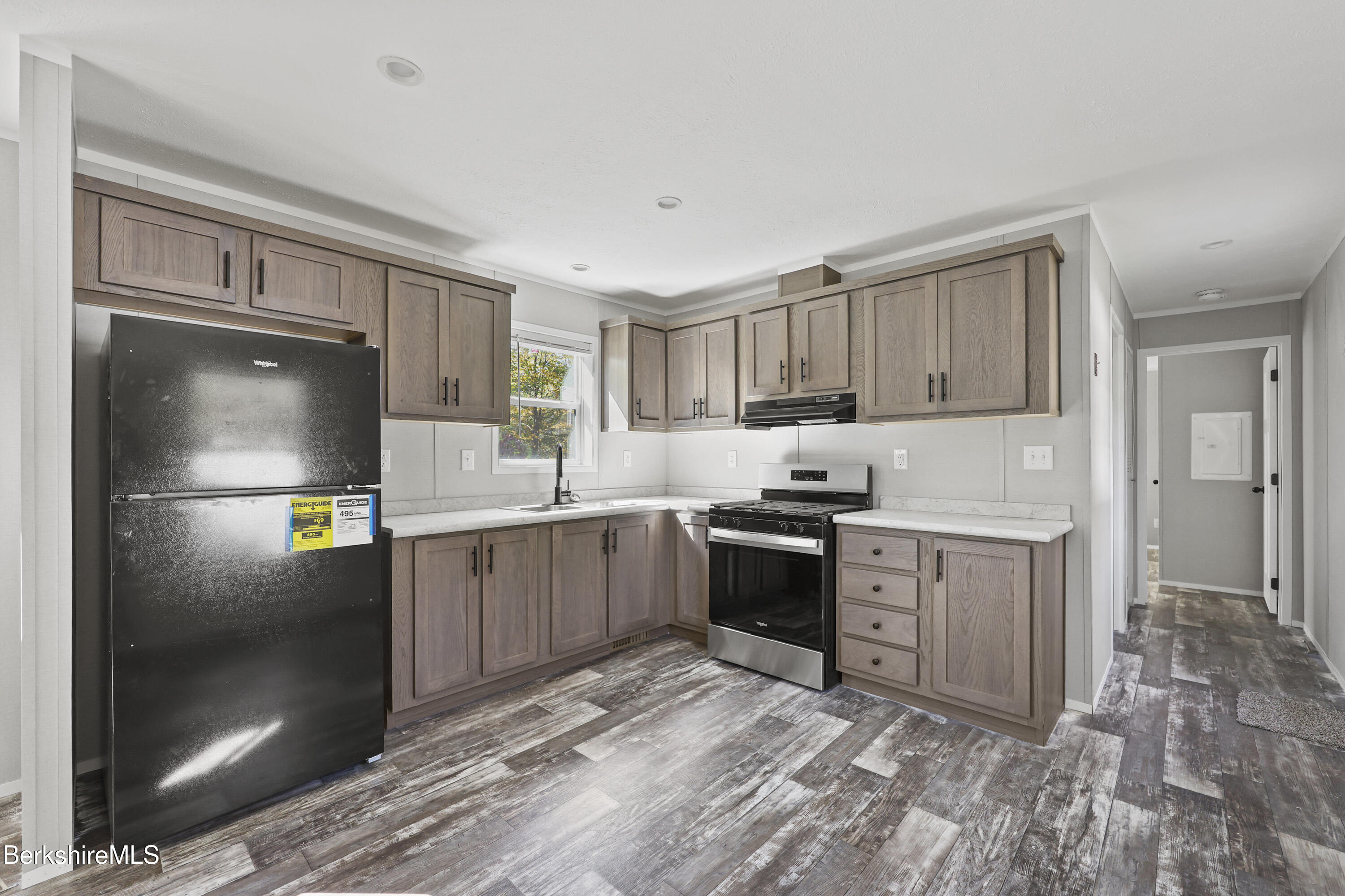 12 Aztec Drive North Adams, MA 01247 - Photo 6 of 14 a kitchen with granite countertop a refrigerator stove top oven and sink