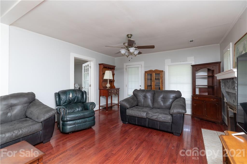 4551 River Road Smyrna, SC 29743 - Photo 4 of 19 a living room with furniture and a flat screen tv