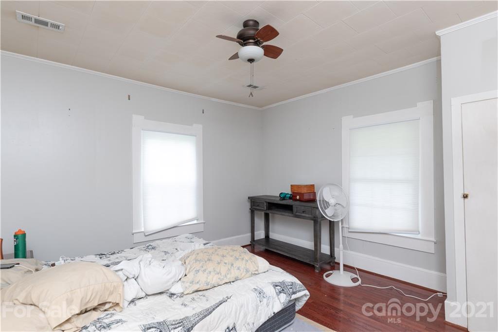 4551 River Road Smyrna, SC 29743 - Photo 8 of 19 a bedroom with a bed and a window