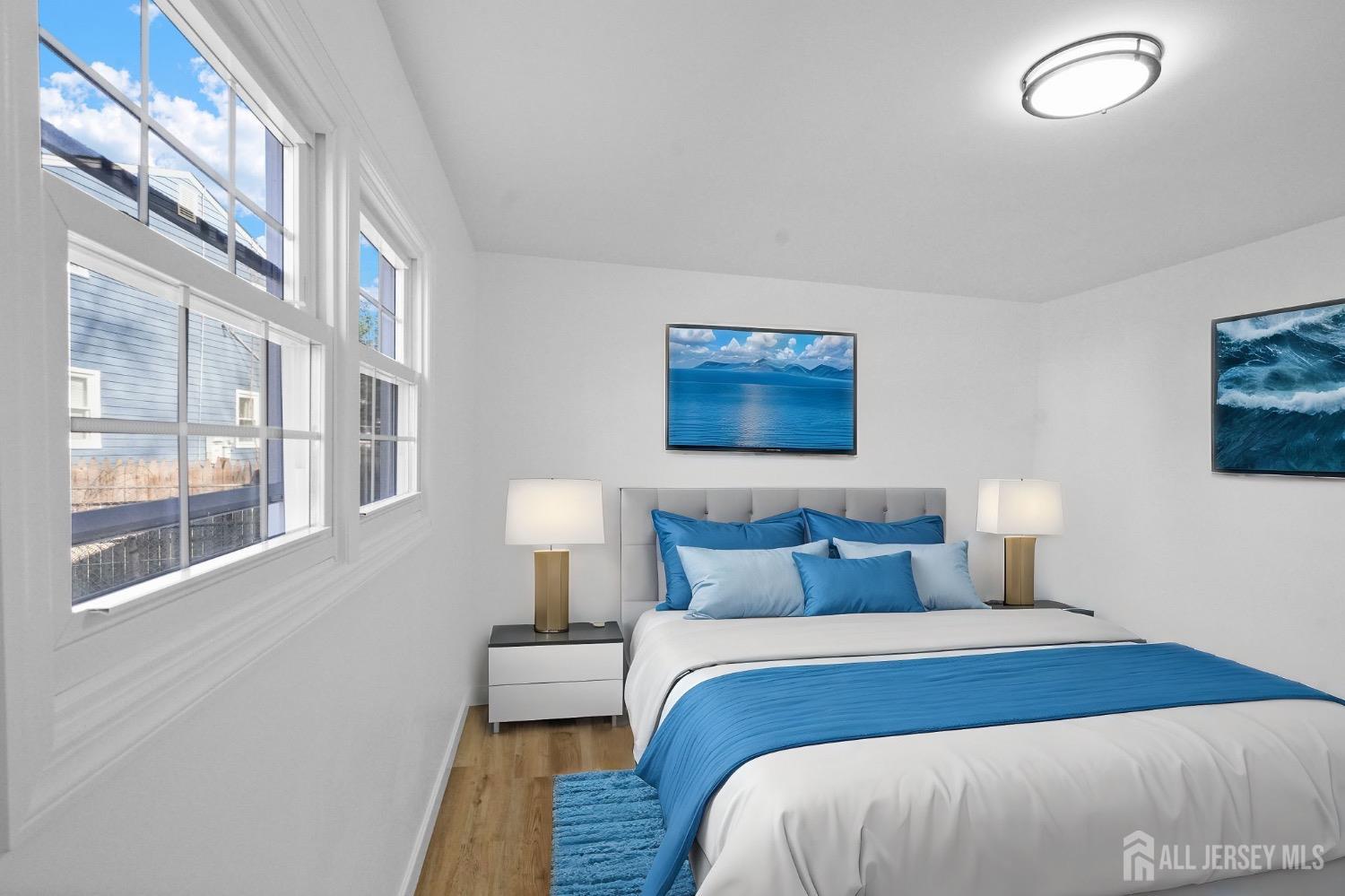 32 Nelson Circle East Brunswick, NJ 08816 - Photo 11 of 35 a bedroom with a bed and night stand