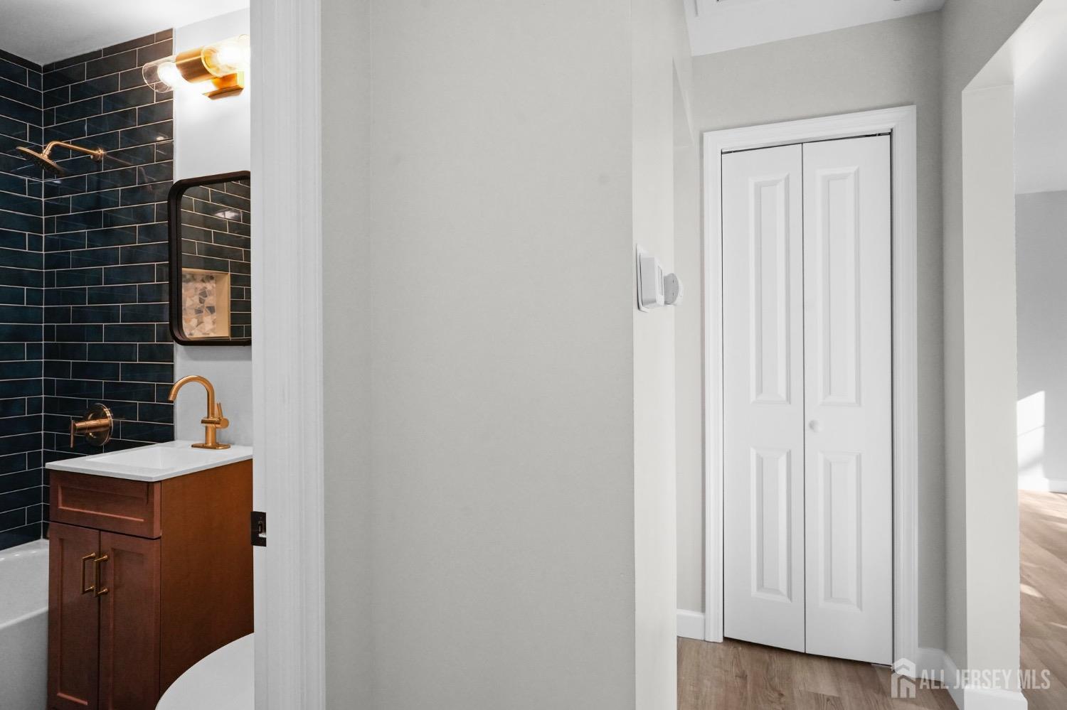 32 Nelson Circle East Brunswick, NJ 08816 - Photo 19 of 35 a bathroom with a sink and toilet