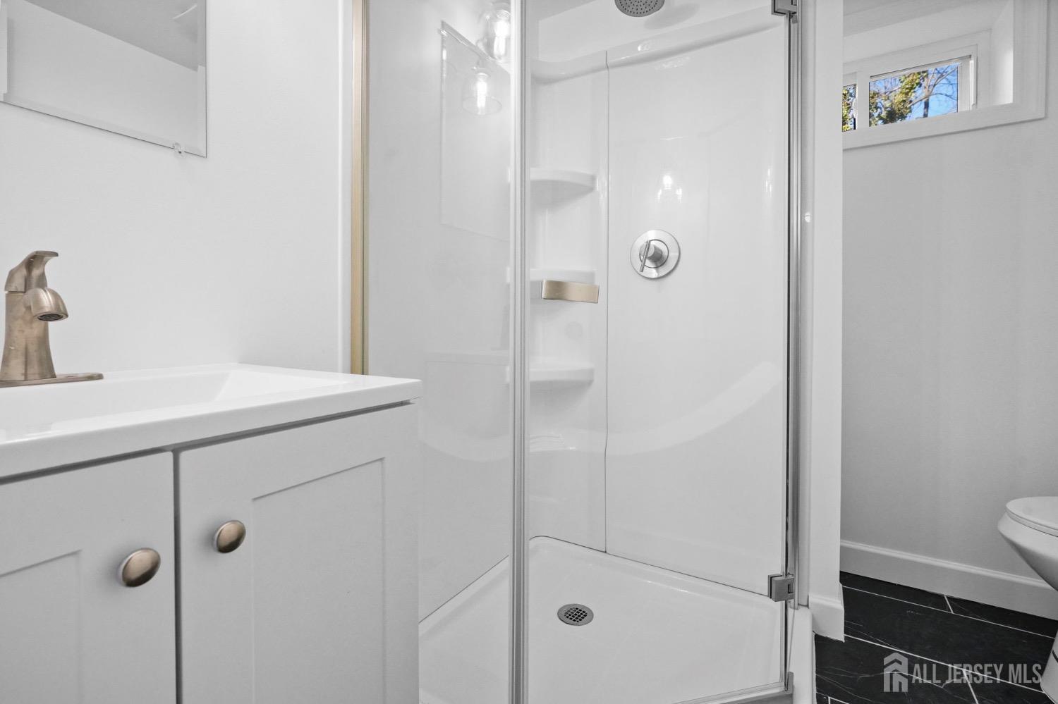 32 Nelson Circle East Brunswick, NJ 08816 - Photo 27 of 35 a bathroom with a shower and sink