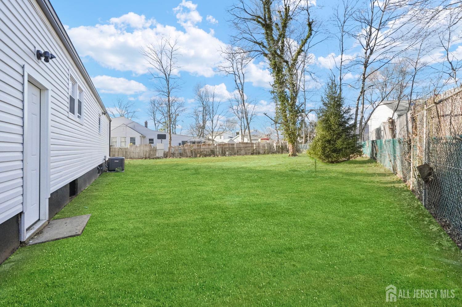 32 Nelson Circle East Brunswick, NJ 08816 - Photo 31 of 35 a view of a park with large trees