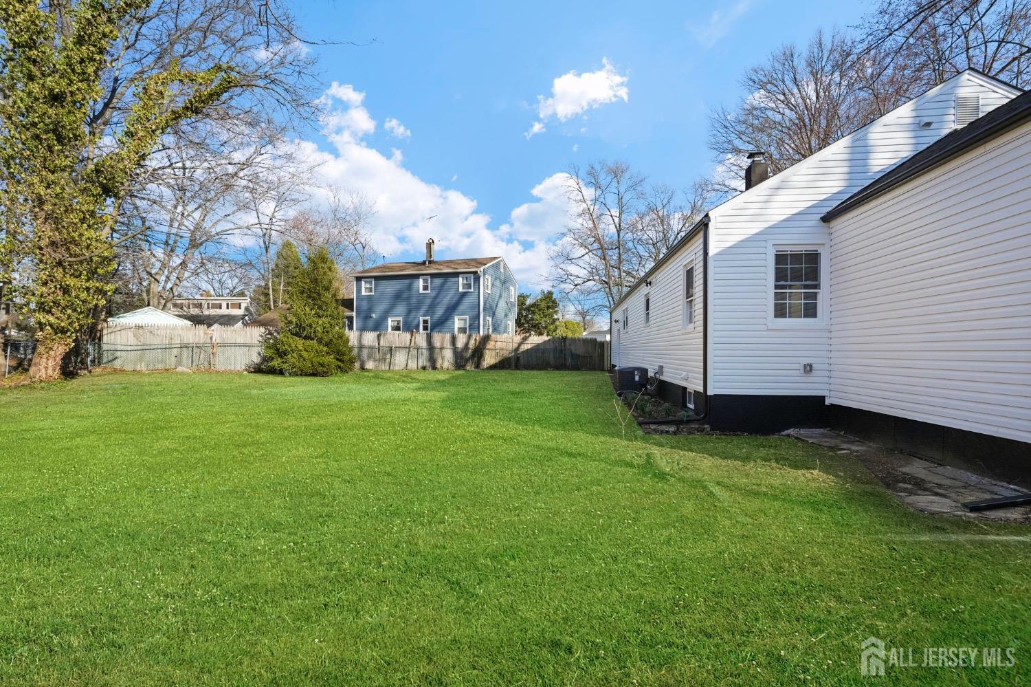 32 Nelson Circle East Brunswick, NJ 08816 - Photo 33 of 35 a view of a house with a big yard