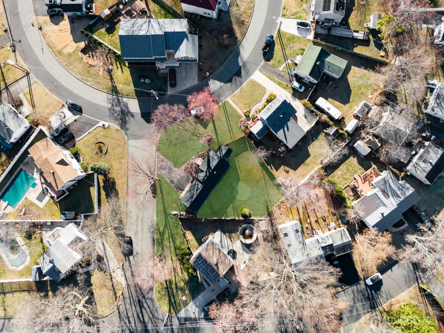 32 Nelson Circle East Brunswick, NJ 08816 - Photo 35 of 35 an aerial view of multiple houses with yard