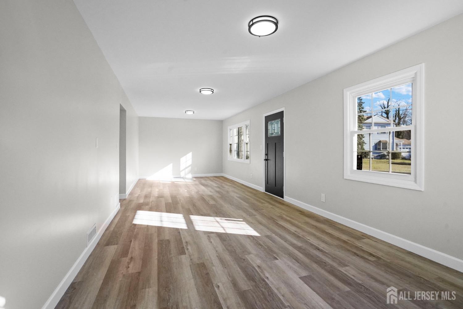 32 Nelson Circle East Brunswick, NJ 08816 - Photo 7 of 35 a view of entryway with wooden floor