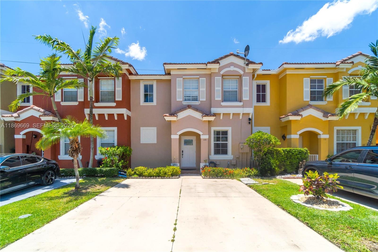 120 Southeast 6th Road Homestead, FL 33030 - Photo 1 of 31 a front view of a house with a garden and plants