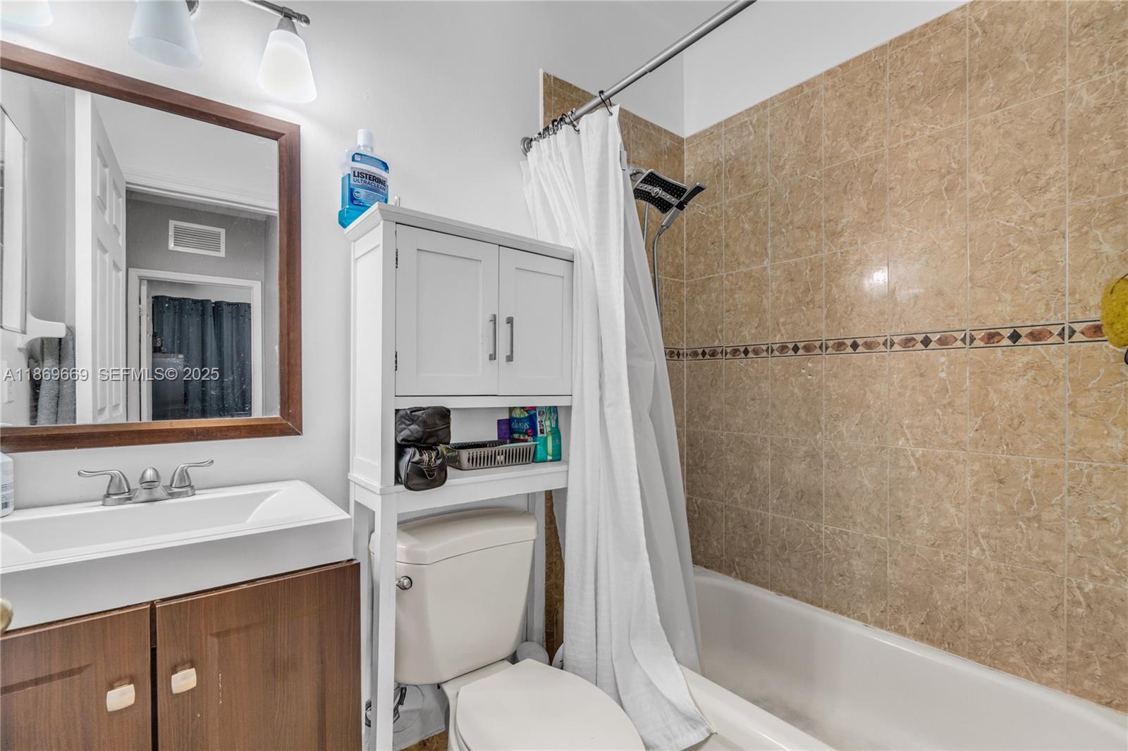 120 Southeast 6th Road Homestead, FL 33030 - Photo 14 of 31 a bathroom with a granite countertop sink toilet and shower