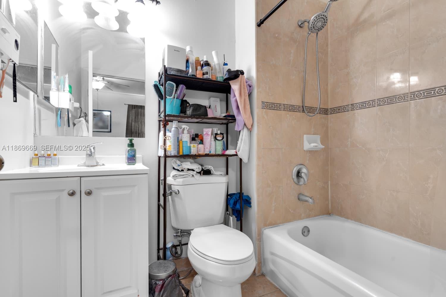 120 Southeast 6th Road Homestead, FL 33030 - Photo 16 of 31 a bathroom with a sink toilet and shower