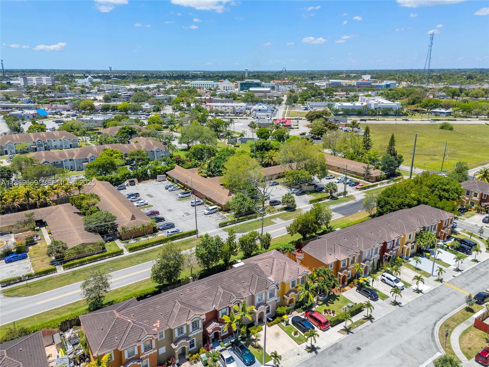 120 Southeast 6th Road Homestead, FL 33030 - Photo 25 of 31 an aerial view of residential houses with outdoor space and ocean view