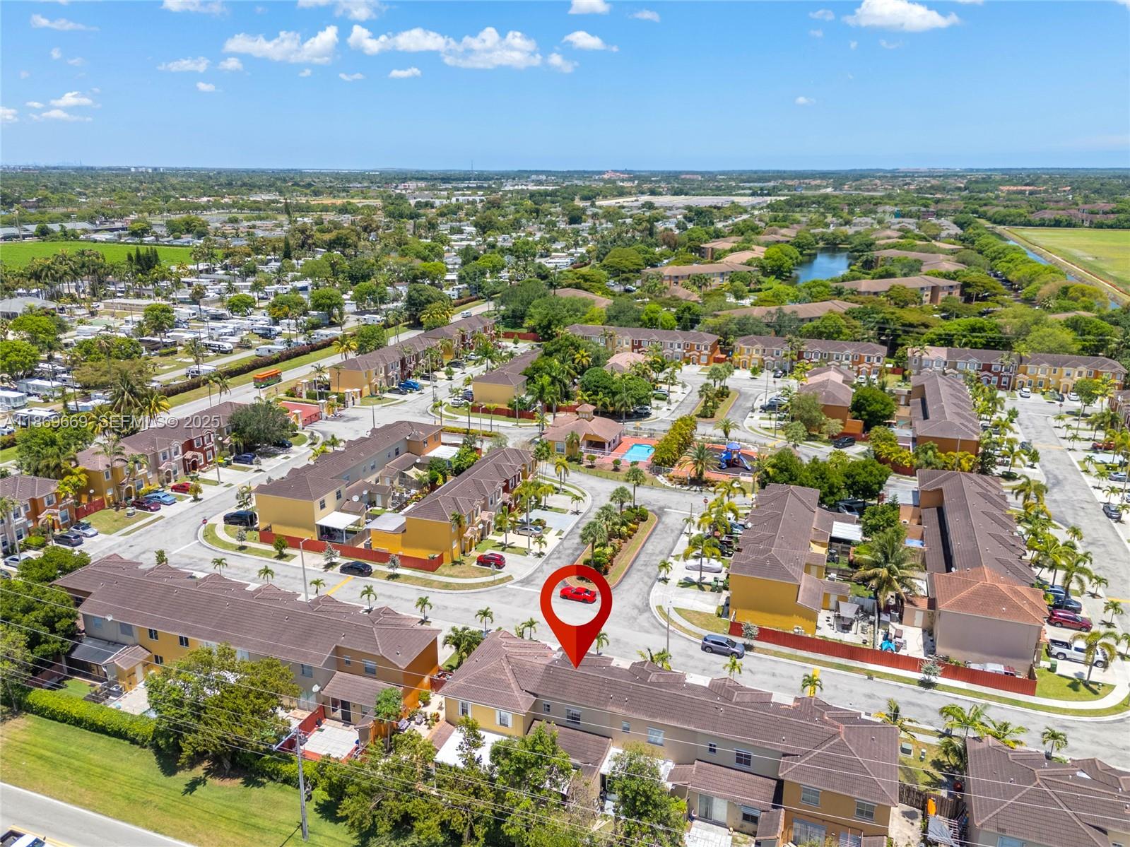 120 Southeast 6th Road Homestead, FL 33030 - Photo 27 of 31 an aerial view of residential houses with outdoor space and river view