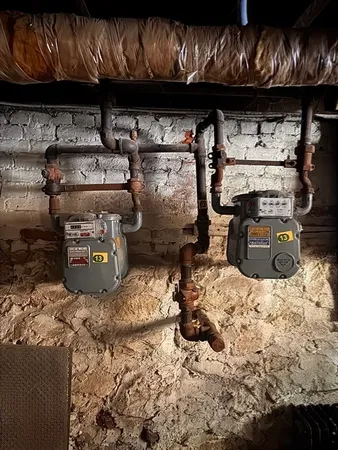 a view of a building with a door and a chair