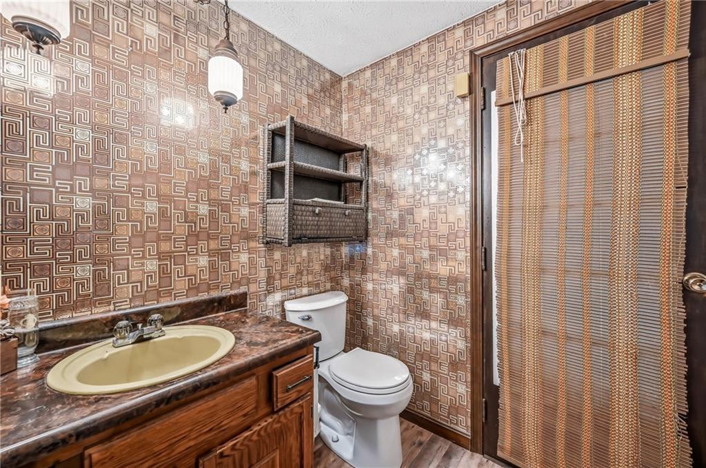 520 South Maysville Road Greenville, PA 16125 - Photo 16 of 33 a bathroom with a sink a toilet and mirror