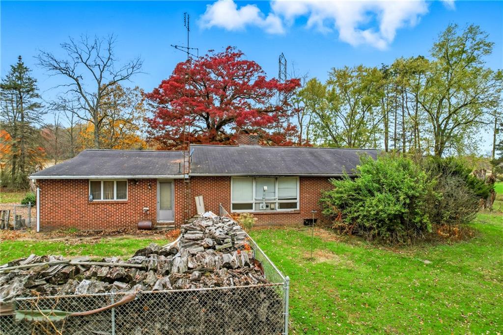 520 South Maysville Road Greenville, PA 16125 - Photo 30 of 33 a front view of a house with a garden