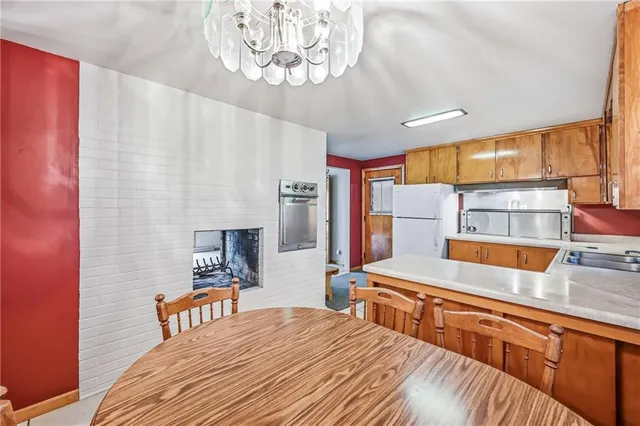 a bedroom with a bed and a table in it