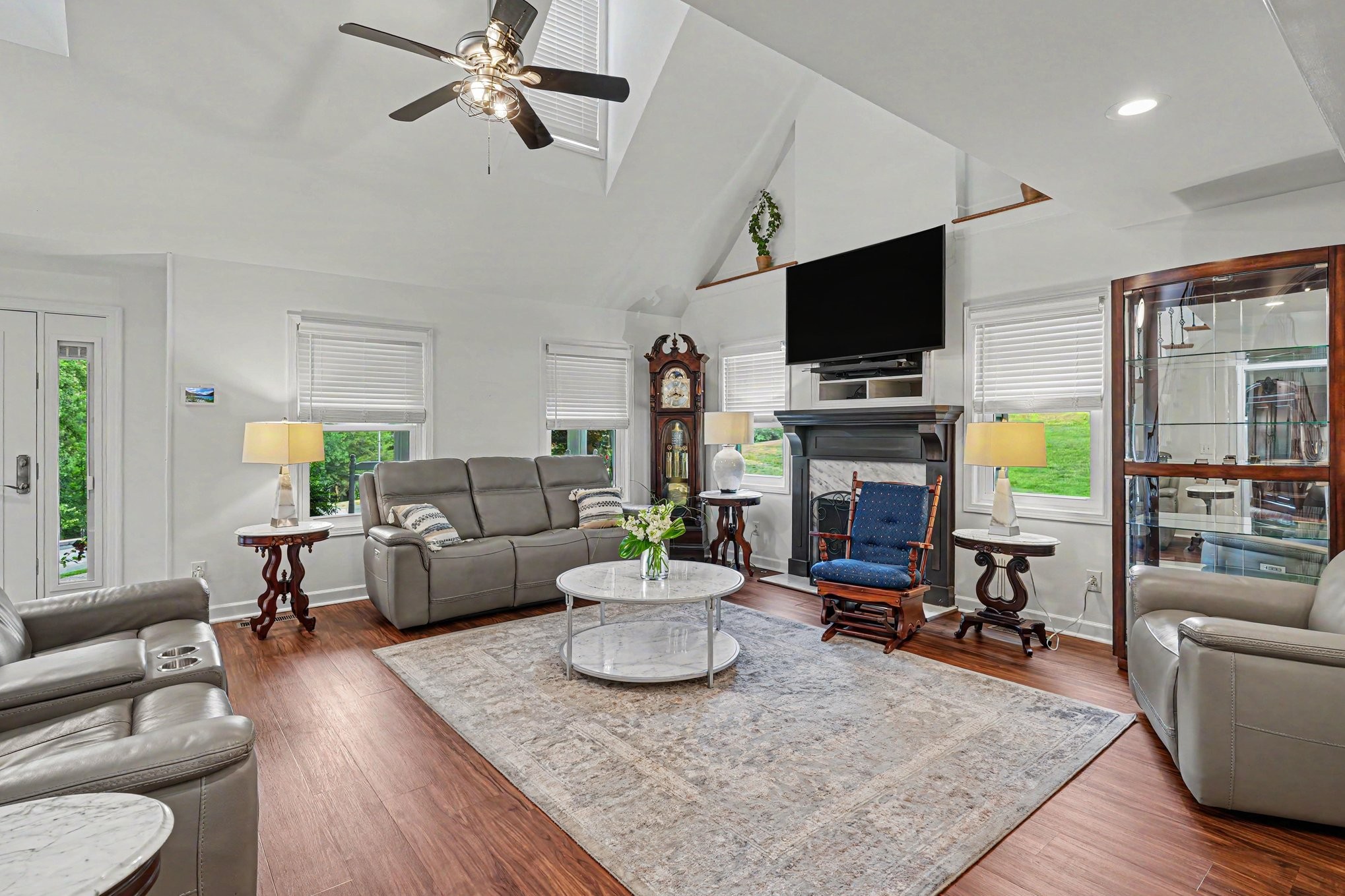 5833 Highway 76 East Springfield, TN 37172 - Photo 10 of 66 a living room with fireplace furniture and a flat screen tv