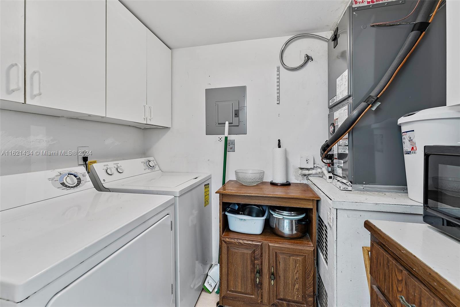 341 Pine Ridge Circle, Unit B2 Greenacres, FL 33463 - Photo 20 of 49 a view of kitchen and sink