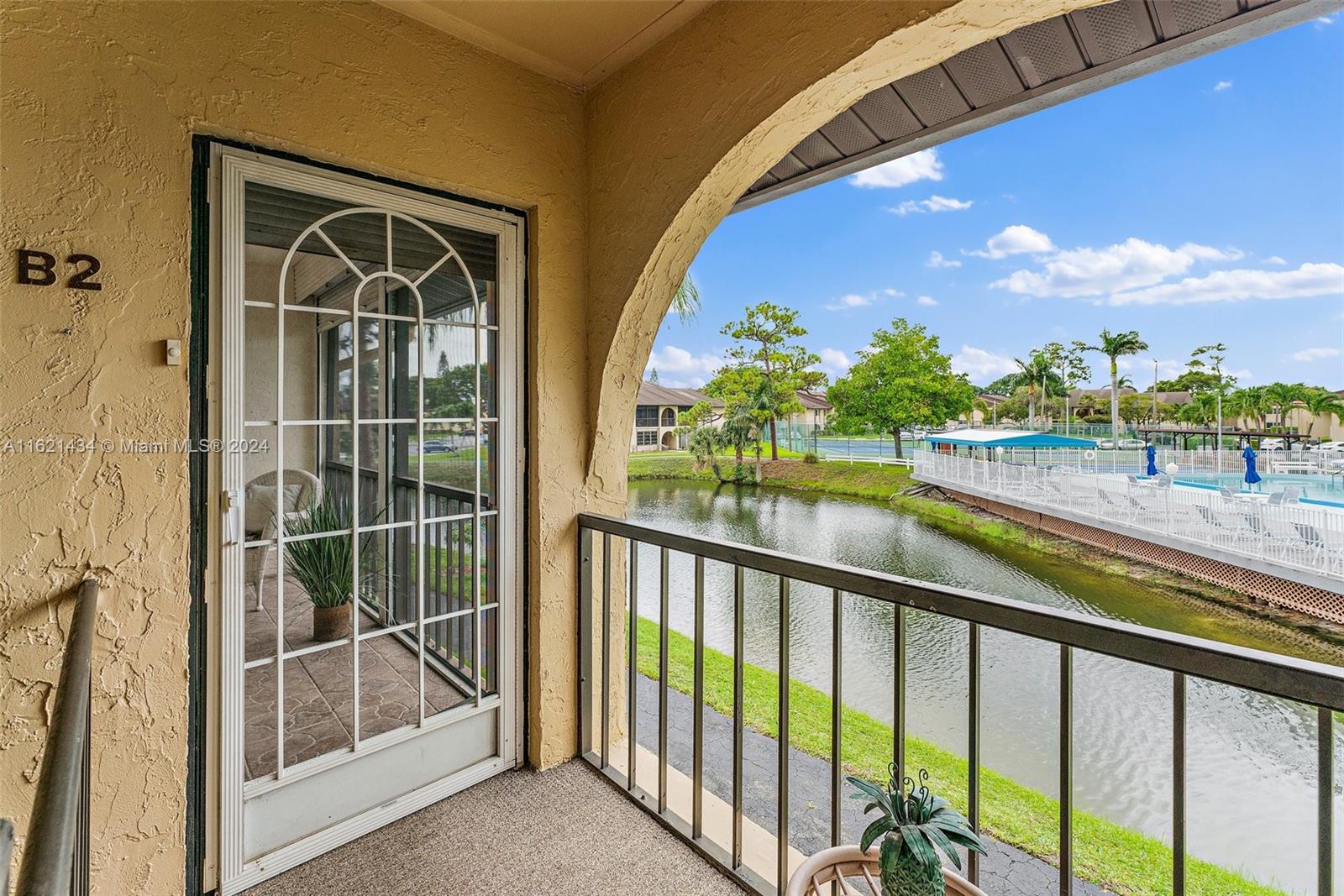 341 Pine Ridge Circle, Unit B2 Greenacres, FL 33463 - Photo 5 of 49 a view of balcony with furniture