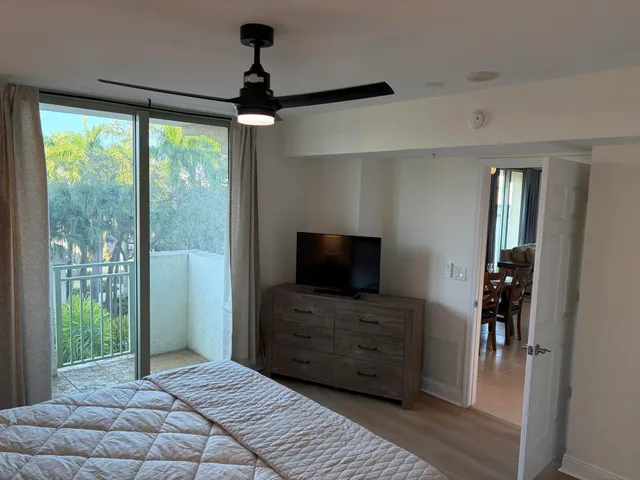 a room with furniture and a flat screen tv
