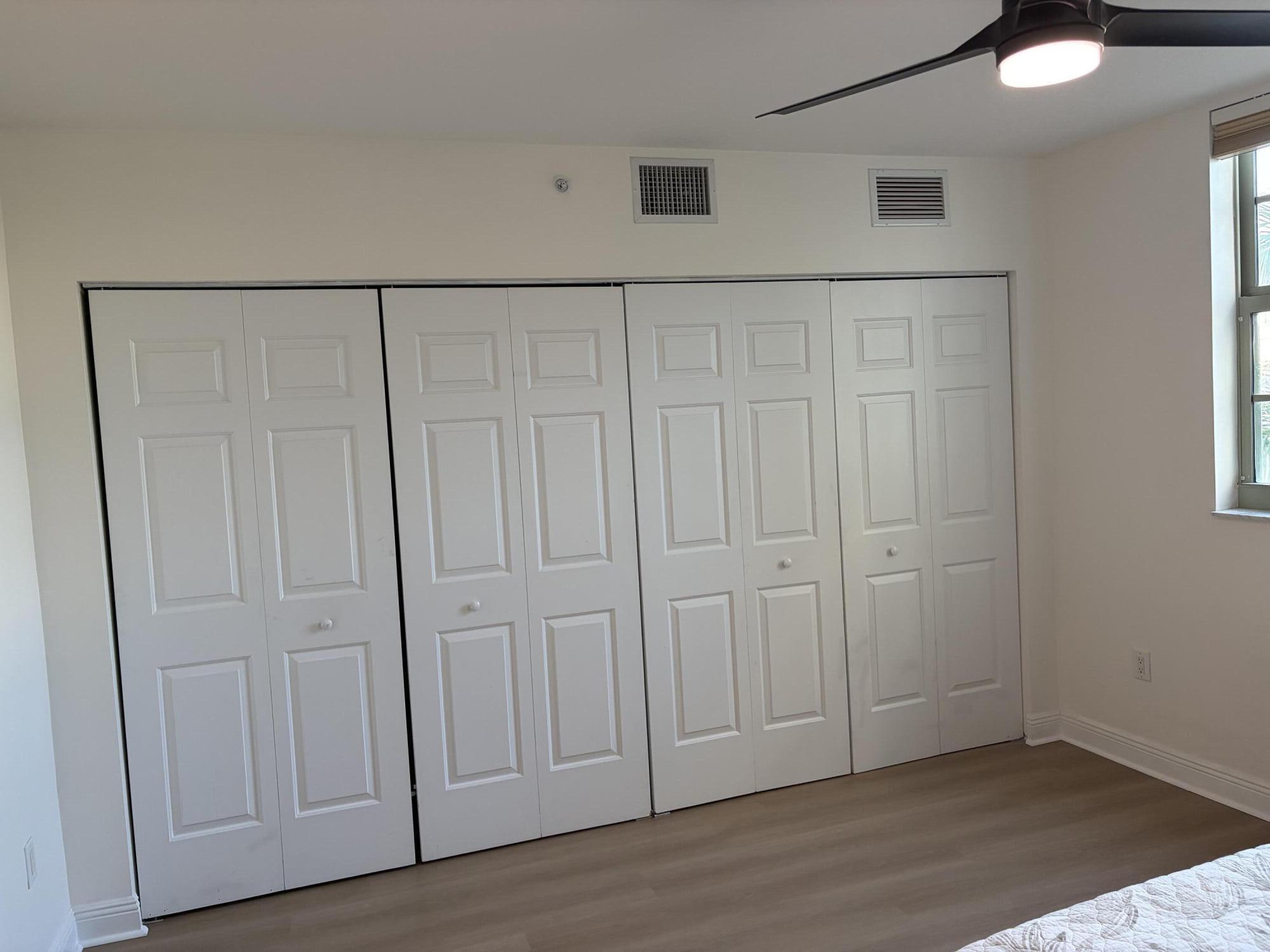 610 Clematis Street West Palm Beach, FL 33401 - Photo 26 of 33 an empty room with wooden floor