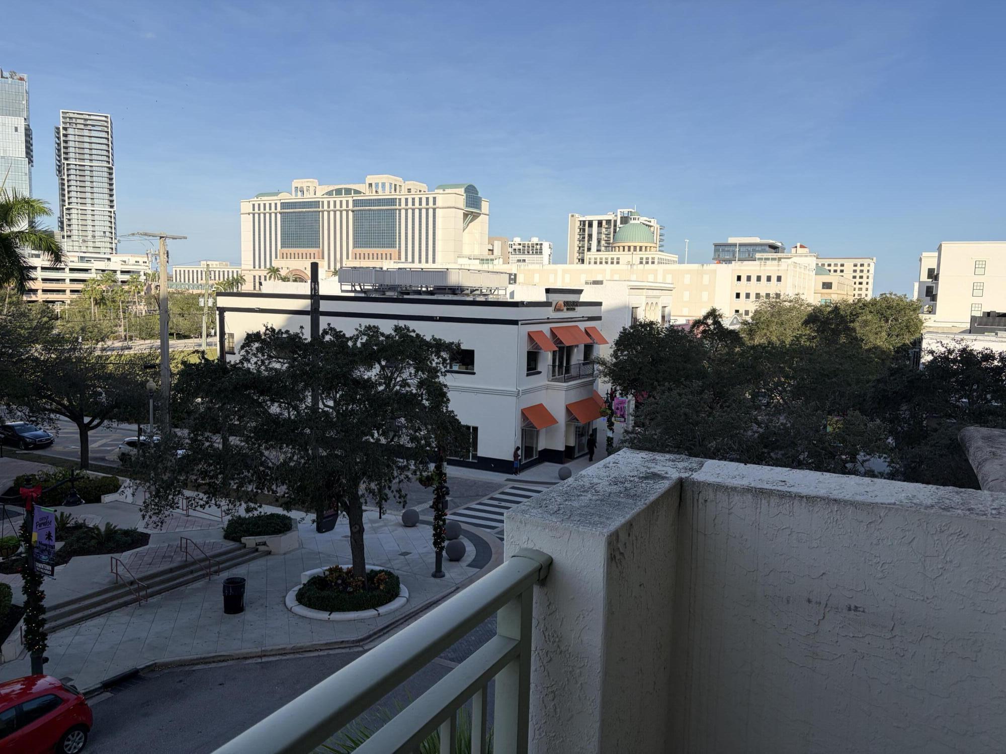 610 Clematis Street West Palm Beach, FL 33401 - Photo 28 of 33 a view of a house with patio entertaining space