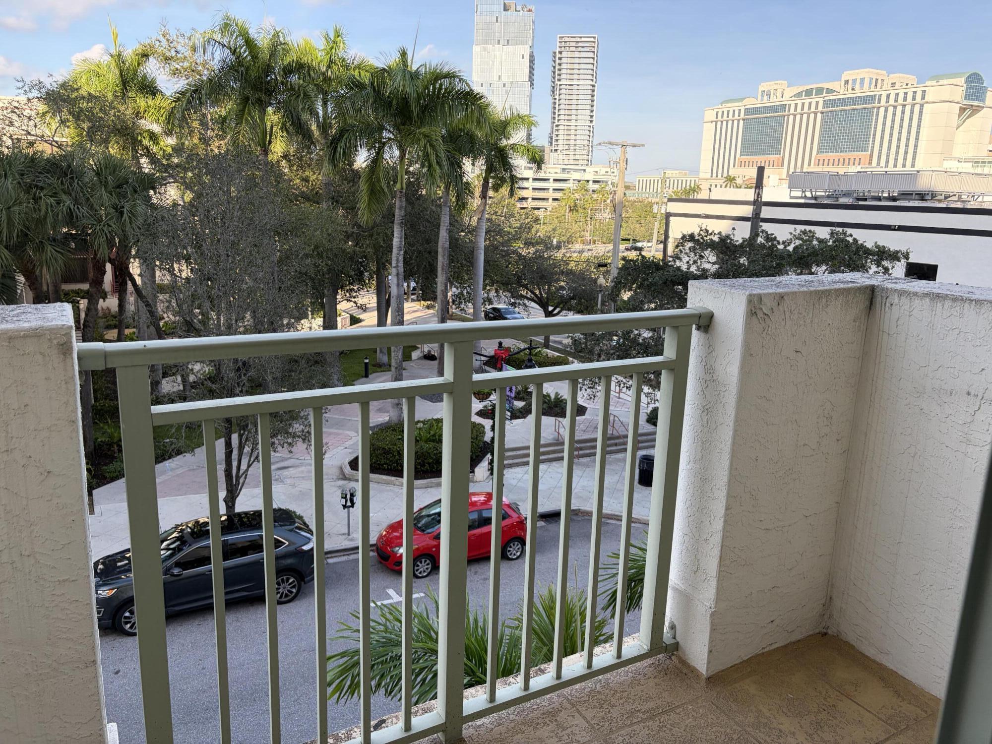 610 Clematis Street West Palm Beach, FL 33401 - Photo 30 of 33 a view of a balcony with chairs