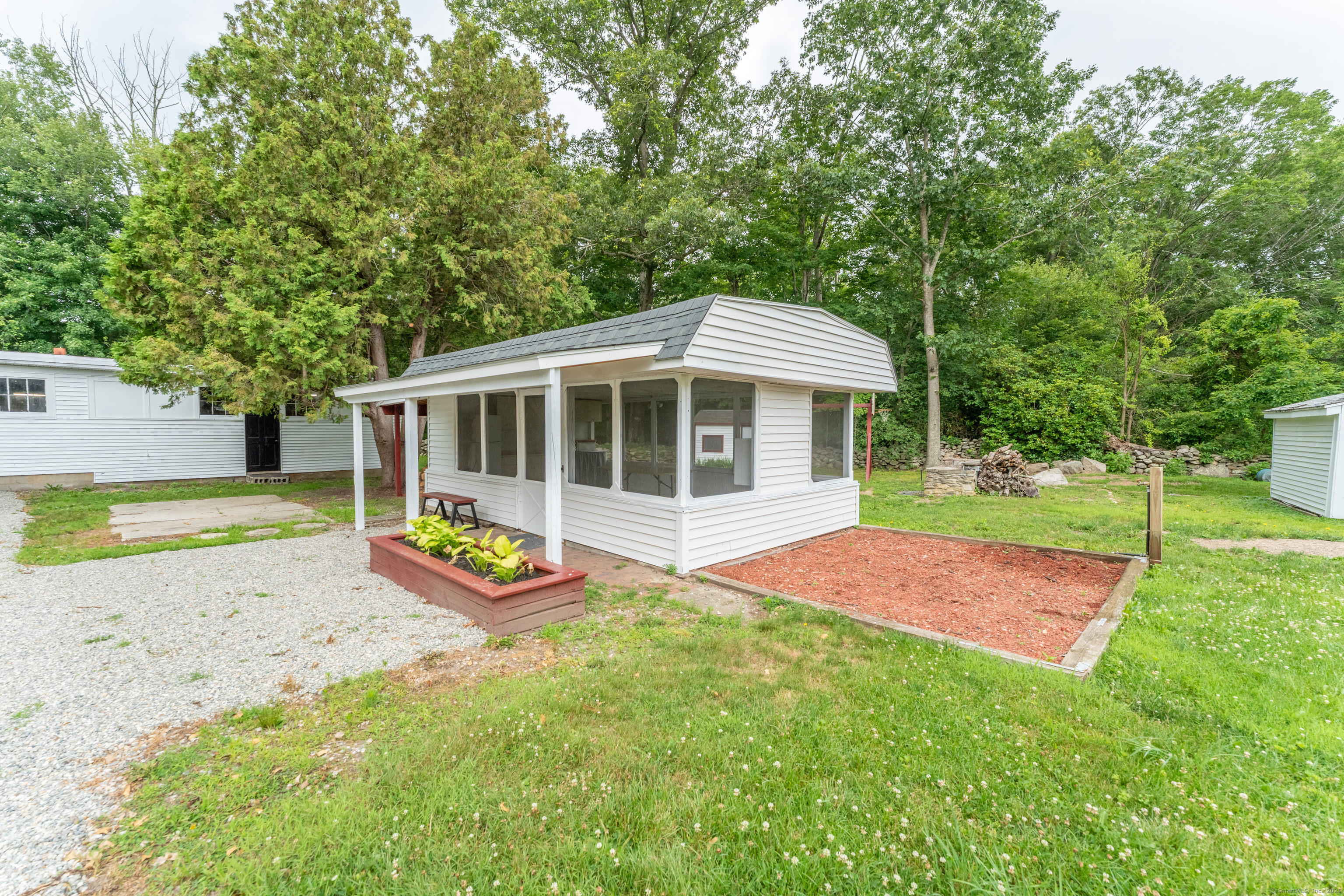 361 Westminster Road Canterbury, CT 06331 - Photo 25 of 38 a house with swimming pool in front of it