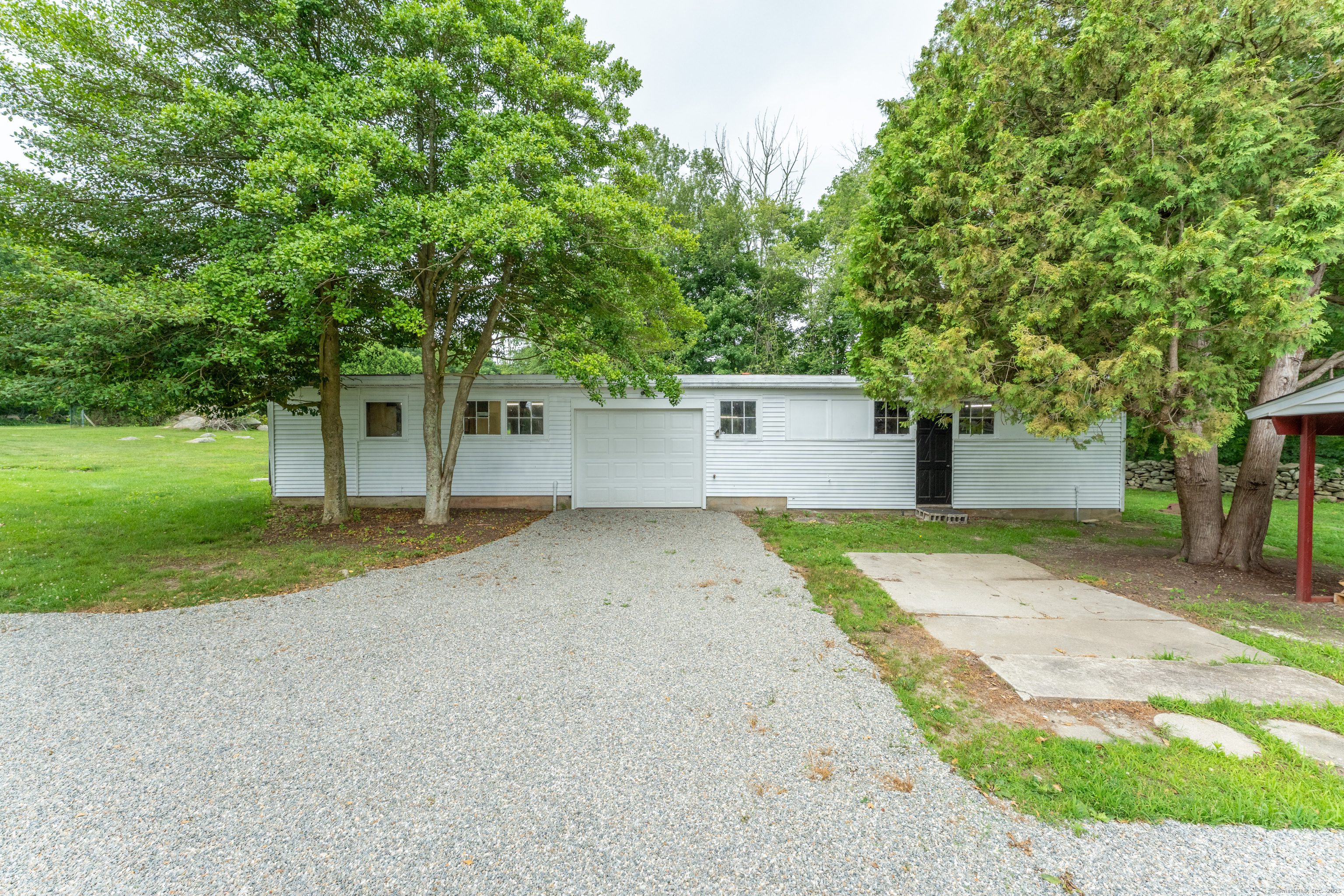 361 Westminster Road Canterbury, CT 06331 - Photo 29 of 38 a view of a yard and garage