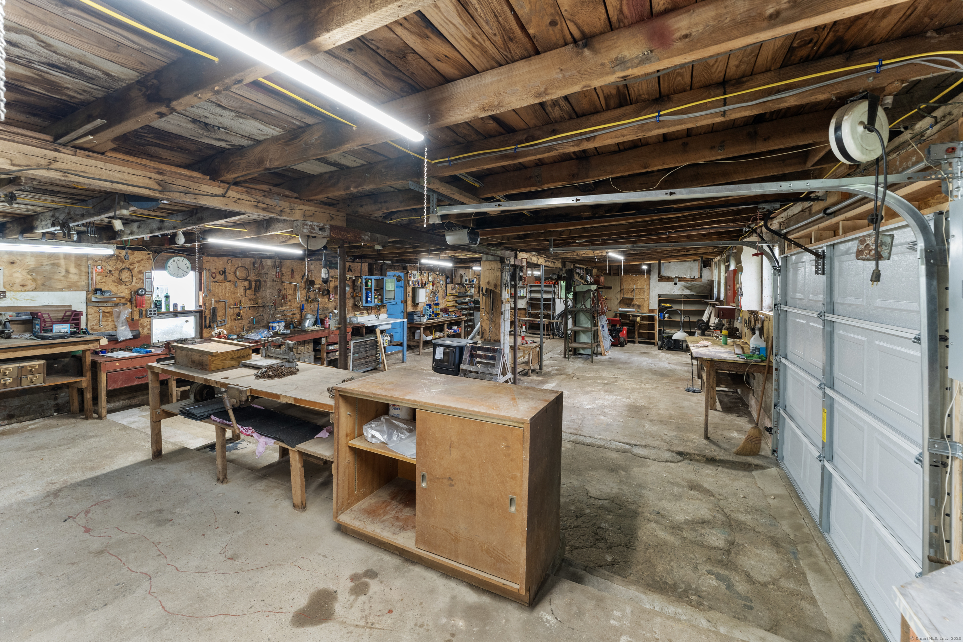 361 Westminster Road Canterbury, CT 06331 - Photo 31 of 38 a view of store room with washer and lots of appliances