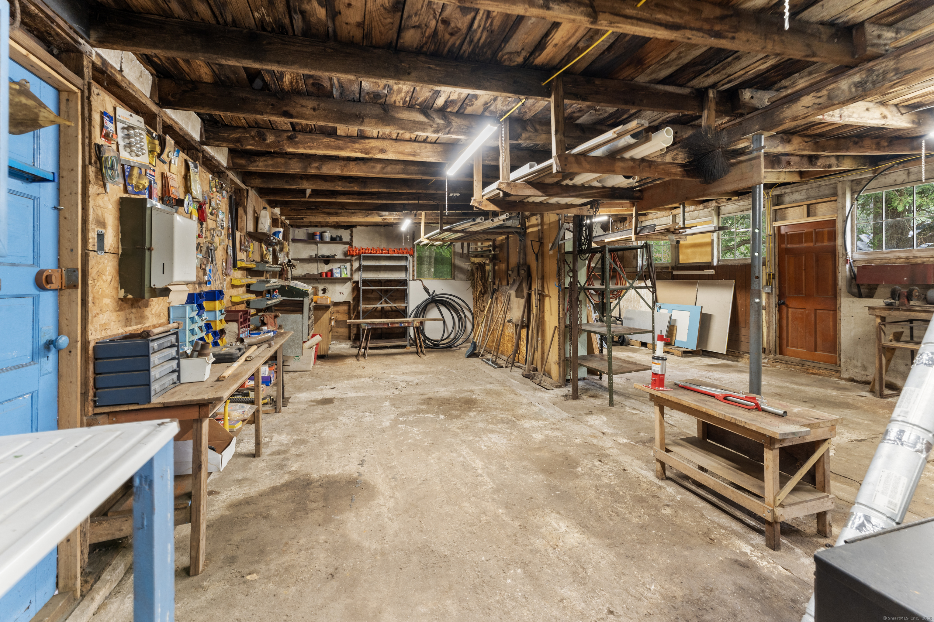 361 Westminster Road Canterbury, CT 06331 - Photo 32 of 38 a view of a storage room with a lot of stuff