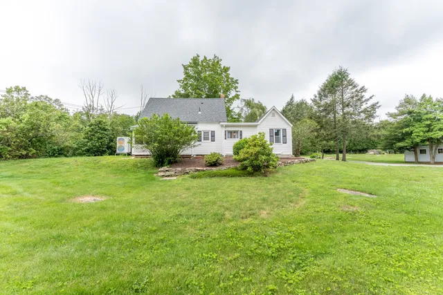 a house view with a garden space