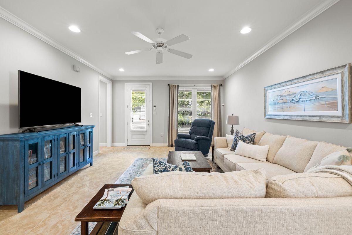 133 South Zander Way Santa Rosa Beach, FL 32459 - Photo 7 of 33 a living room with furniture and a flat screen tv