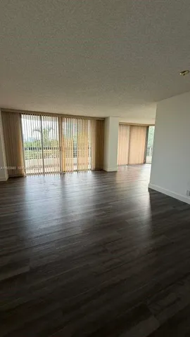 a front view of a building with garden