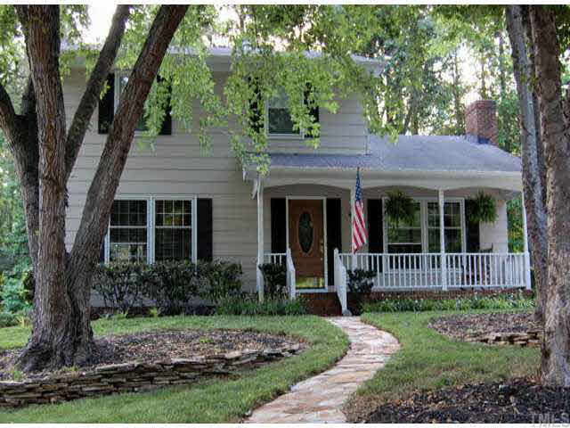 Nice Landscaping frames this friendly home. Exterior Front