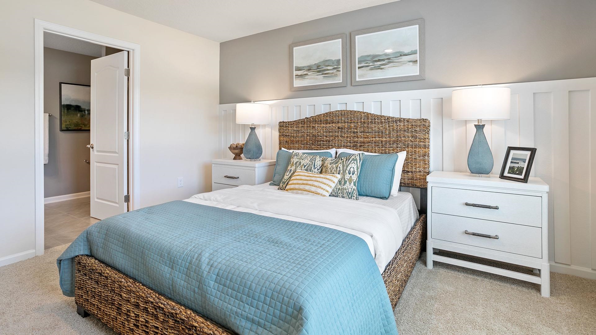 237 Redbud Road Palm Coast, FL 32137 - Photo 13 of 33 a bedroom with a bed and wall painting