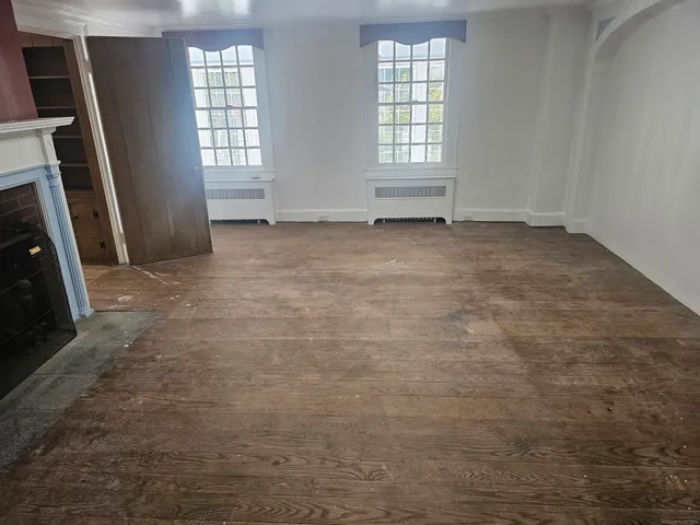 an empty room with windows