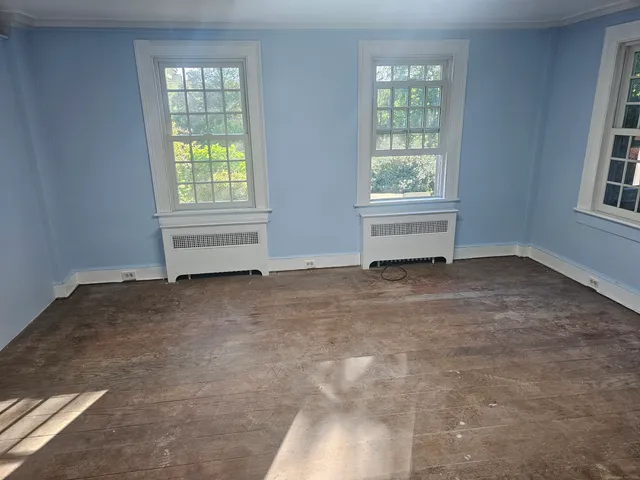 an empty room with windows