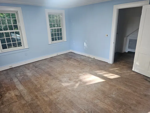 an empty room with windows