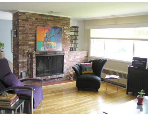 53 Richard Road Needham, MA 02492 - Photo 3 of 4 a living room with furniture and a fireplace