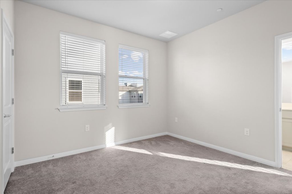 9015 Cattle Baron Path, Unit 705 Austin, TX 78747 - Photo 26 of 35 an empty room with windows