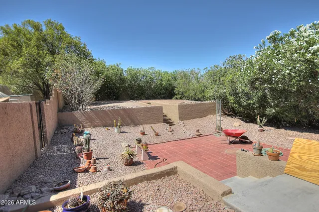 an outdoor space with patio furniture