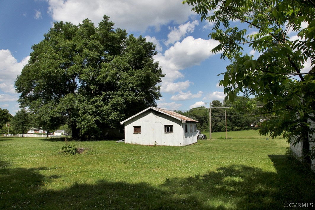 7290 Strath Road Henrico, VA 23231 - Photo 8 of 18 a view of a house with a yard