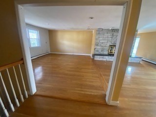 118 Kendall Road Lexington, MA 02421 - Photo 15 of 33 a view of empty room with wooden floor and fan