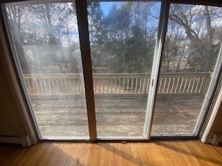 118 Kendall Road Lexington, MA 02421 - Photo 17 of 33 a view of a door with wooden floor