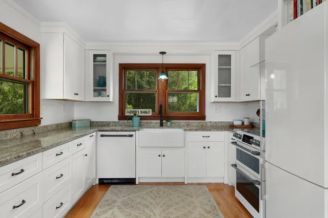 a view of a field with sitting area