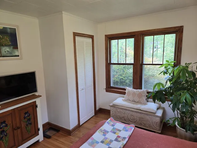 a view of a lake with a yard