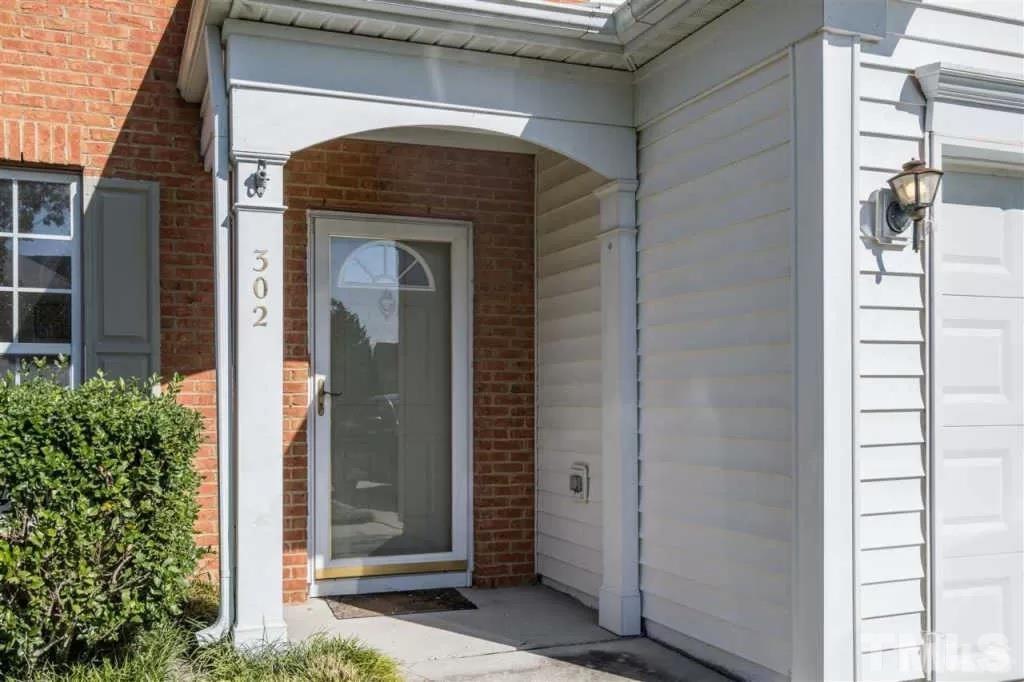 302 Durston Loop Morrisville, NC 27560 - Photo 2 of 4 a view of front door of a house